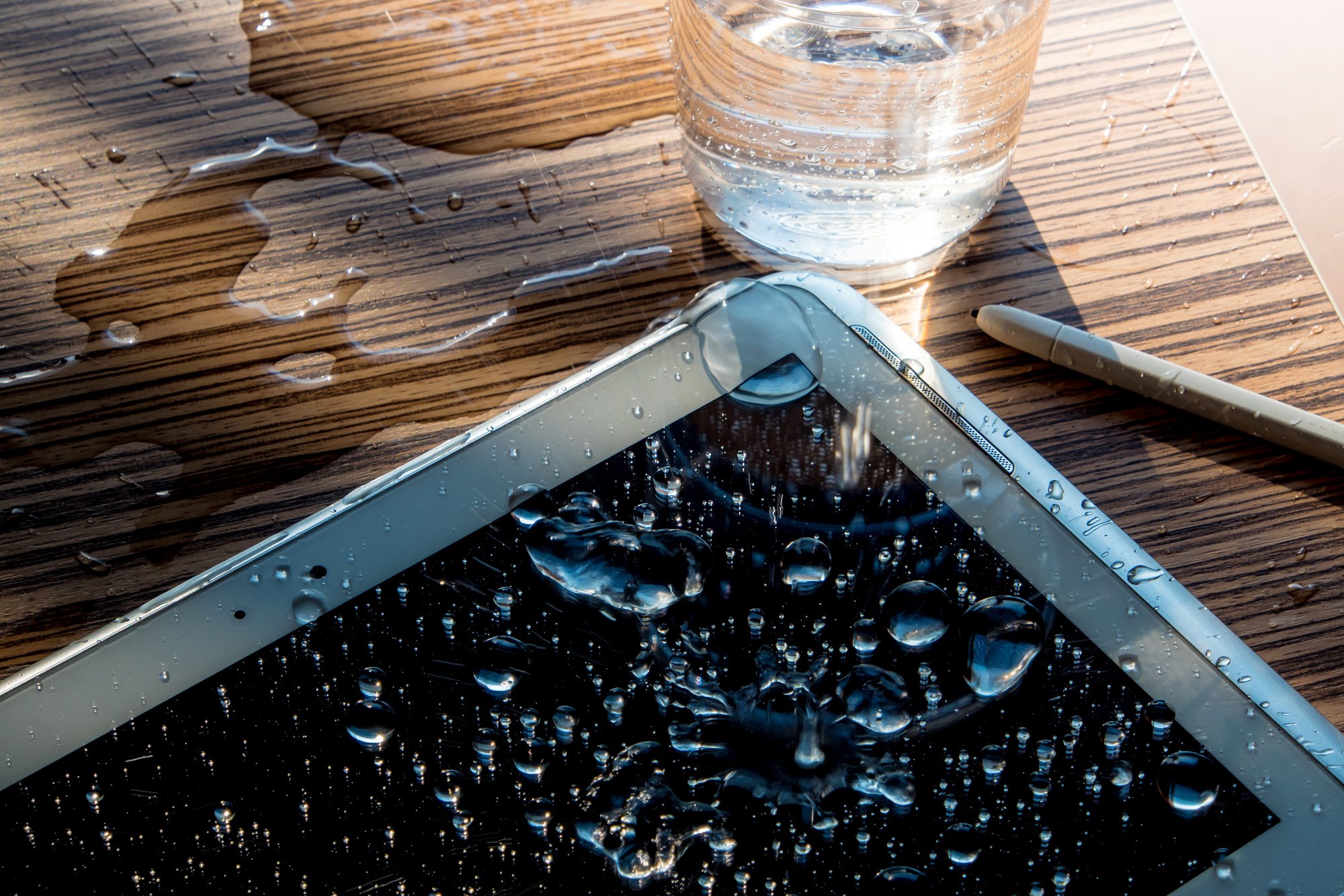 Drops of water on tablet screen tablet repair shop in Kenya